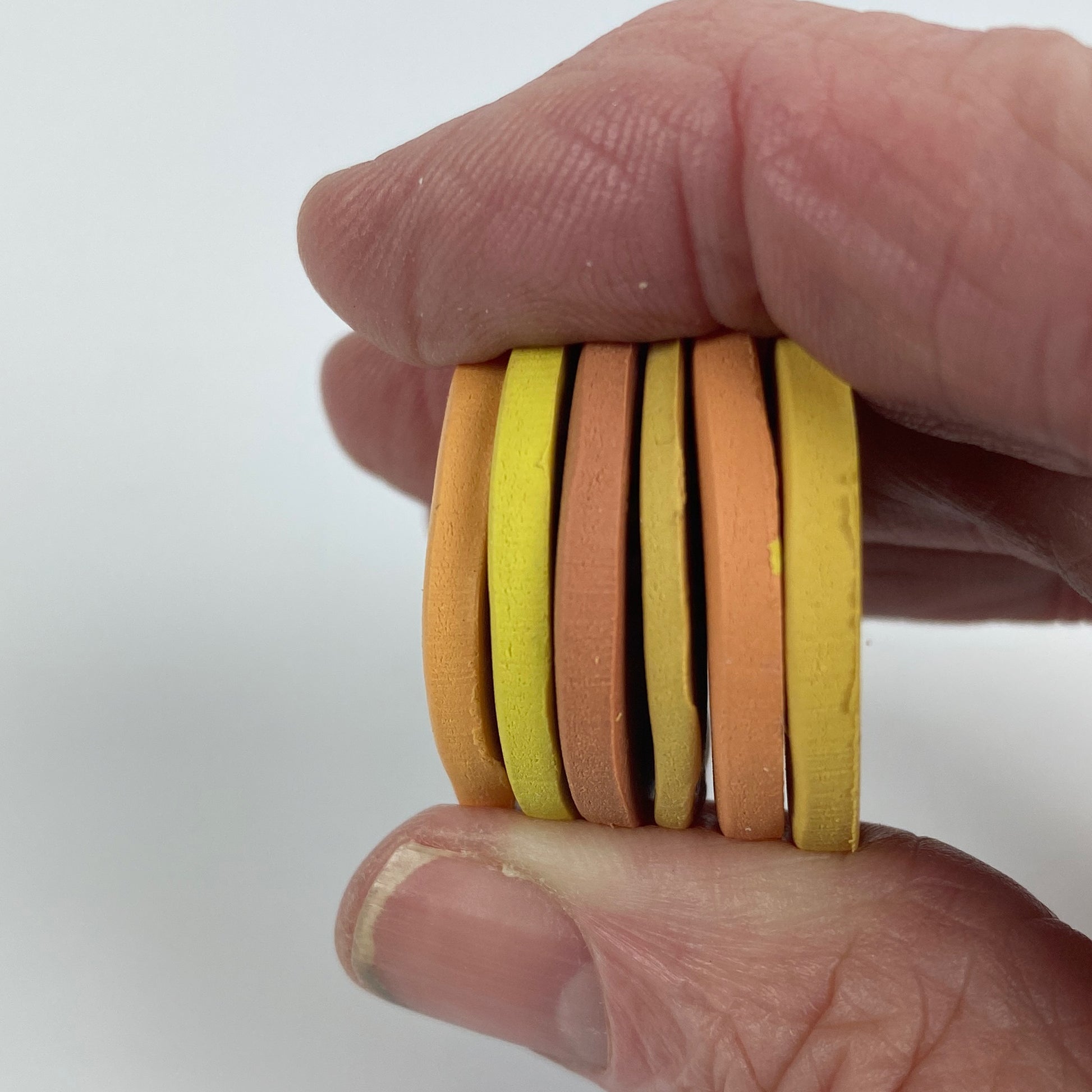 Handheld stack of 6 sample color disks, Summer's End