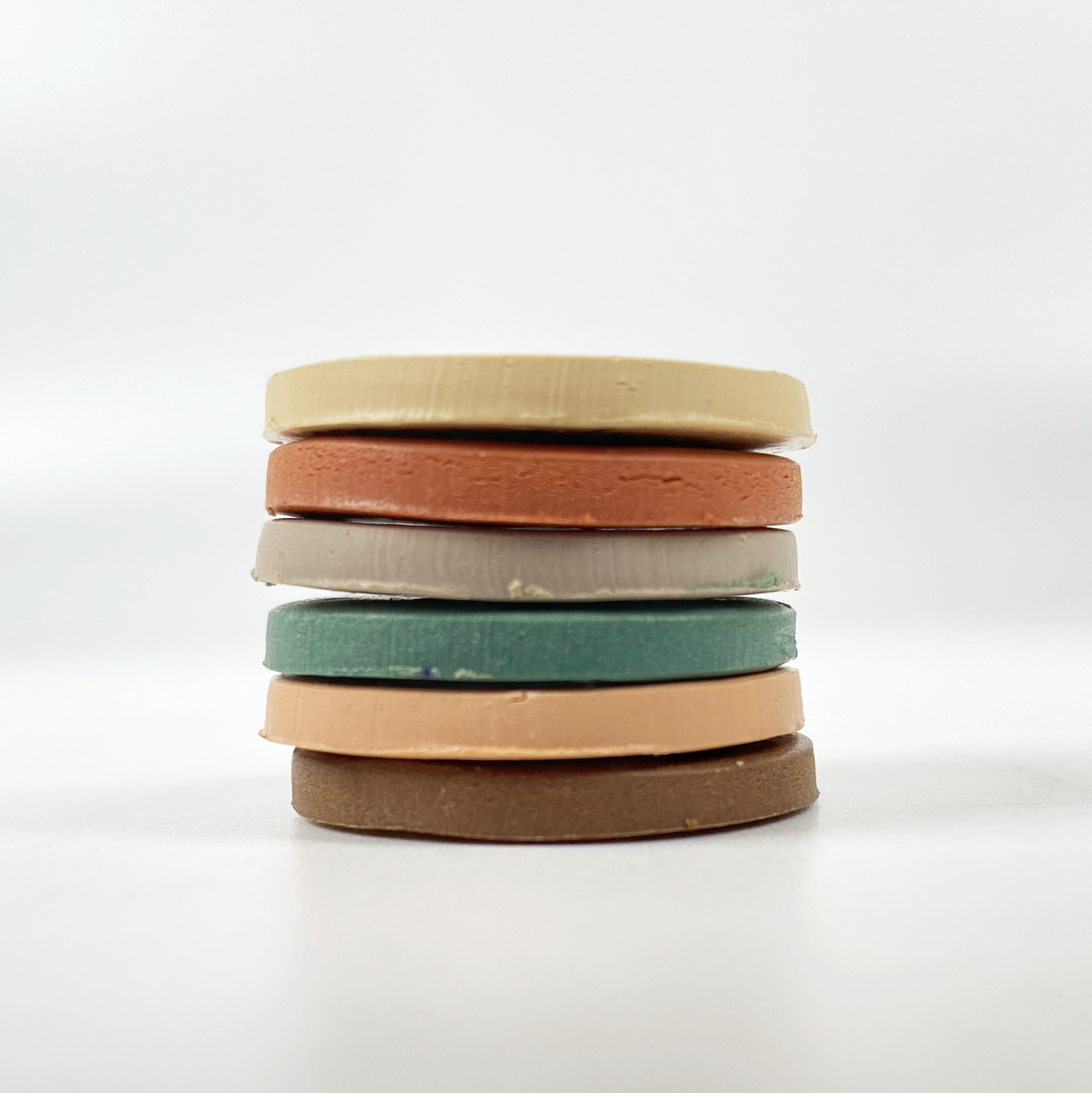 High Desert Palette Polymer Clay Color Mixing Tutorial a stack of sample color clay discs