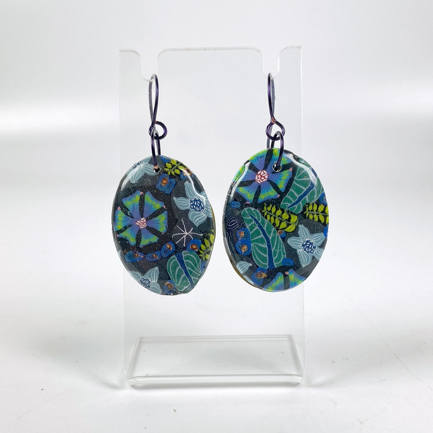 Night Blossom Handmade Polymer Clay Dangle Earrings II on small acrylic display stand