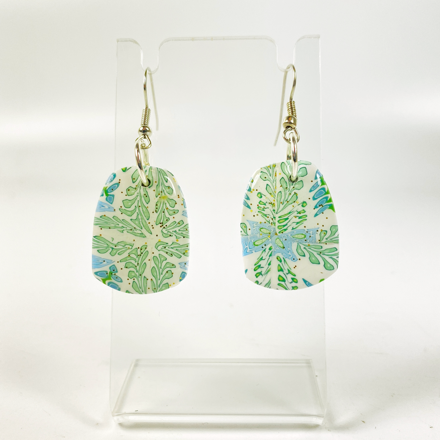 Blue Blossom Handmade Polymer Clay Pendent Earrings on small acrylic display stand