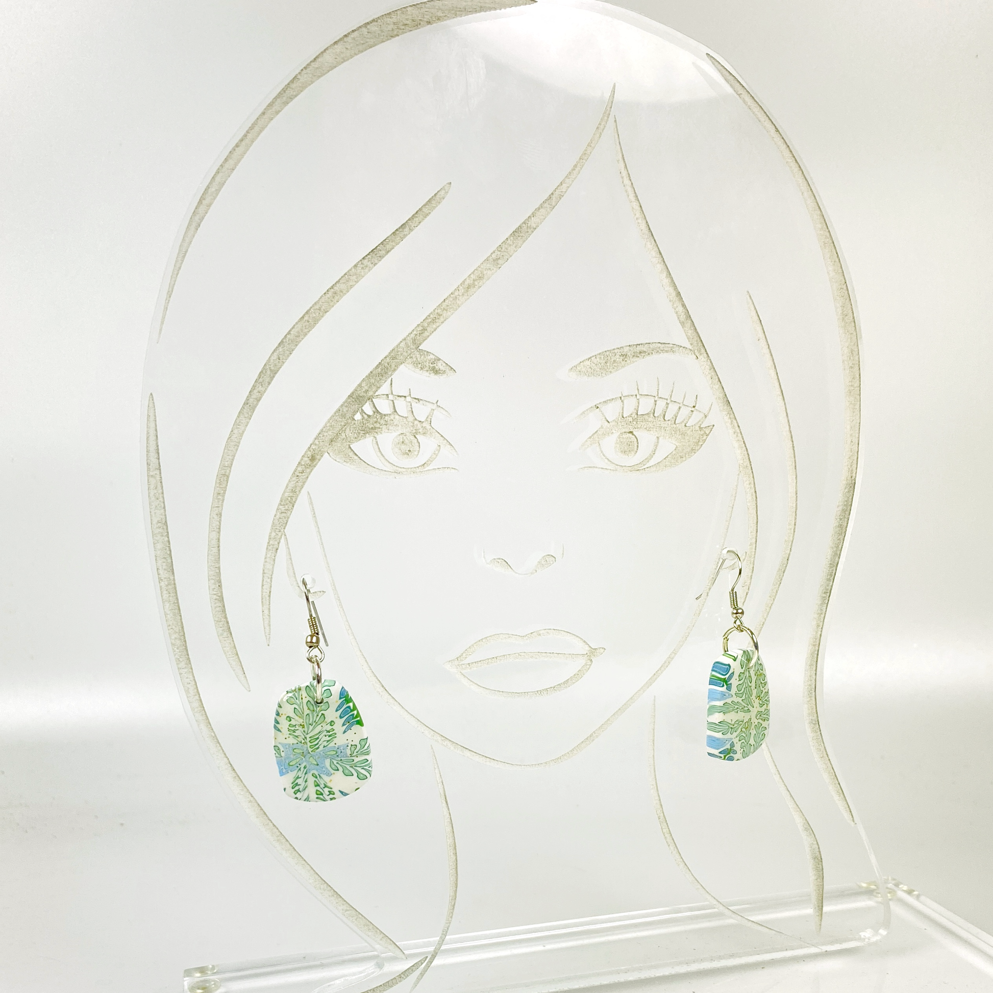 Blue Blossom Handmade Polymer Clay Pendent Earrings on acrylic display head