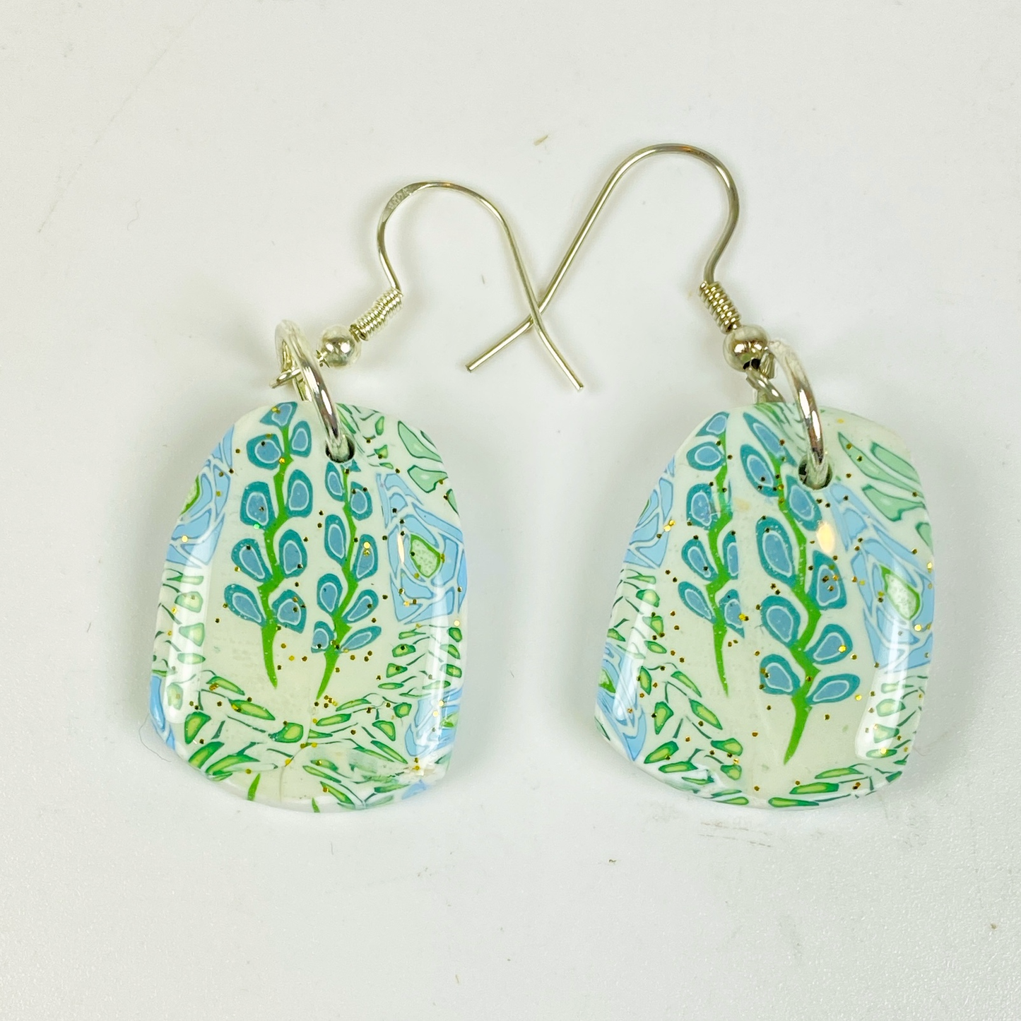 Blue Blossom Handmade Polymer Clay Dangle Earrings on a white background