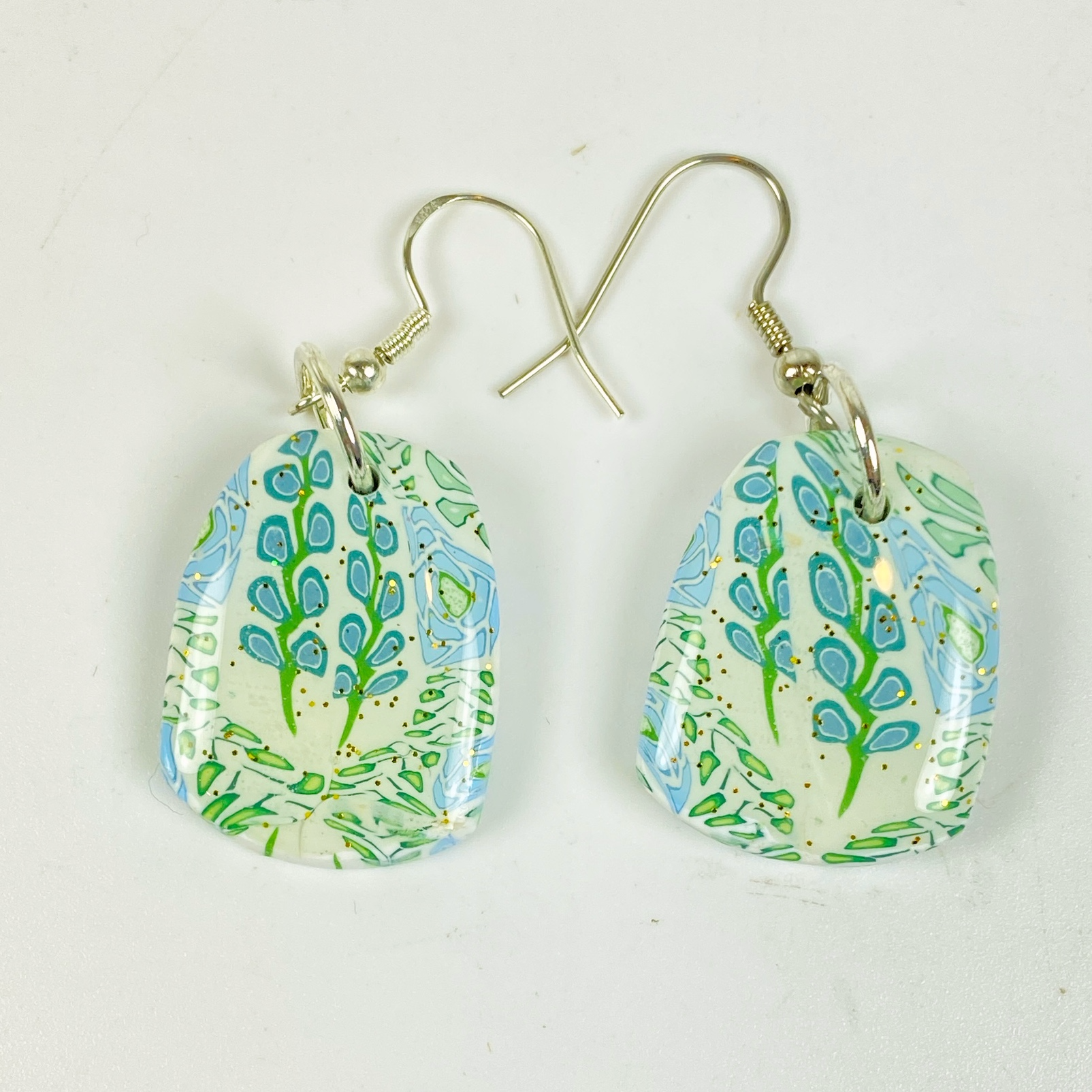 Blue Blossom Handmade Polymer Clay Dangle Earrings on a white background