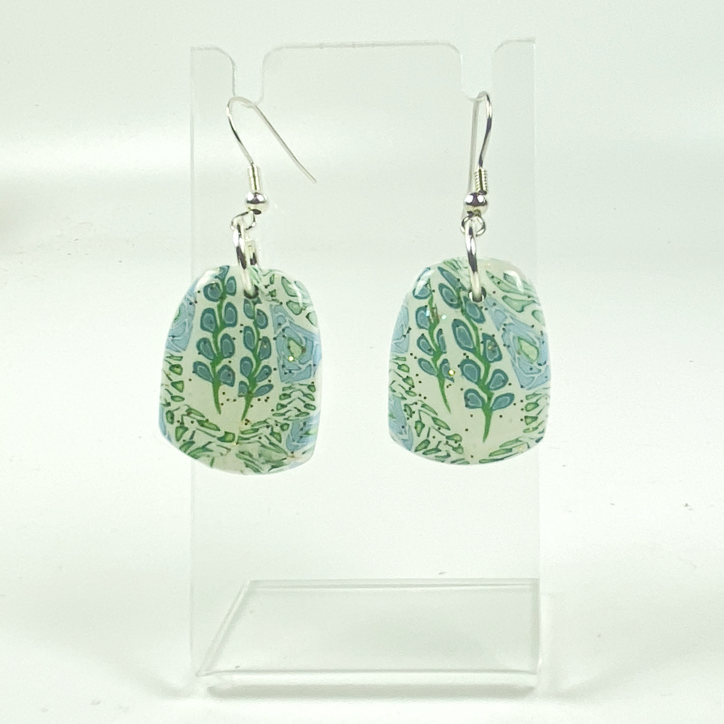Blue Blossom Handmade Polymer Clay Dangle Earrings on small acrylic earring display stand