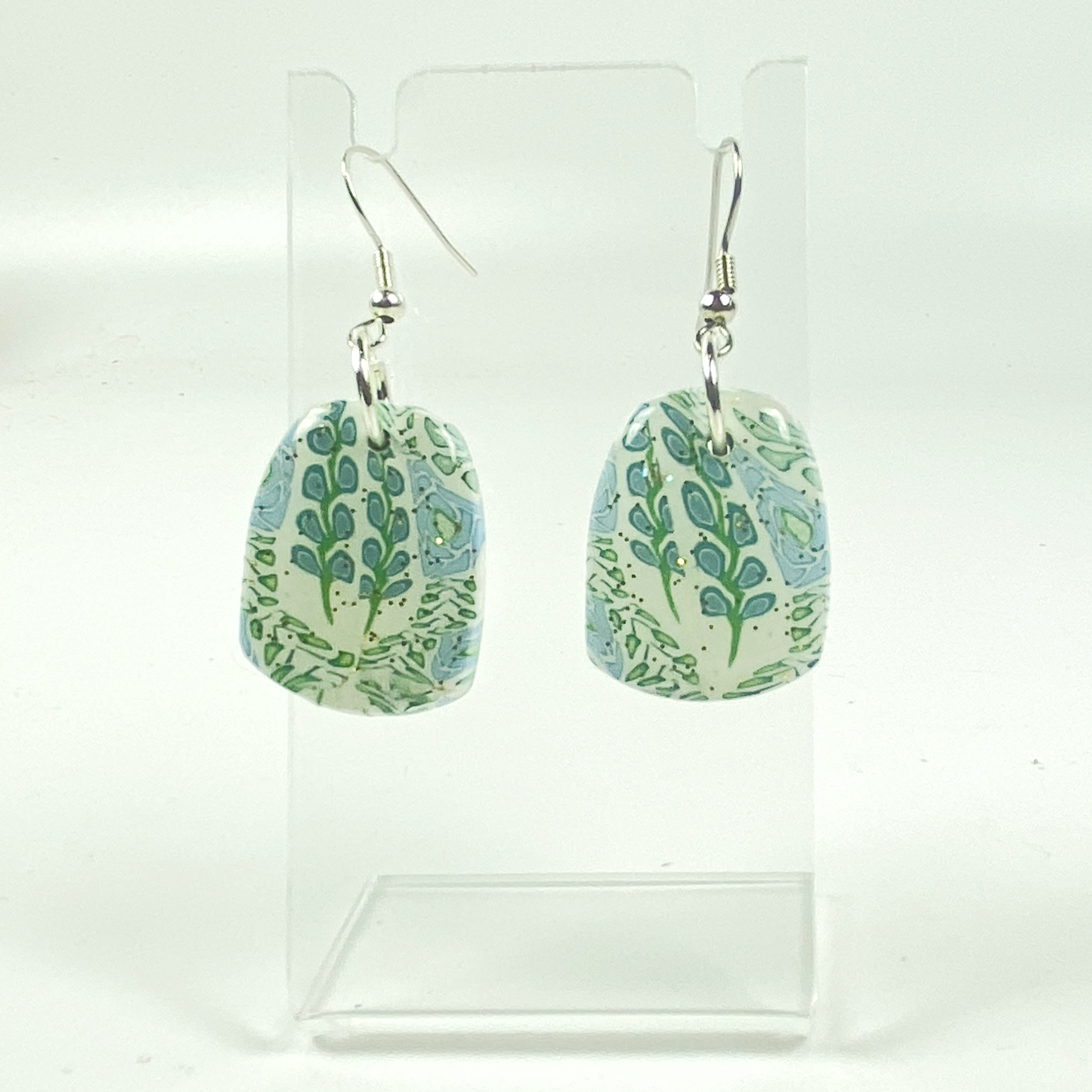 Blue Blossom Handmade Polymer Clay Dangle Earrings on small acrylic earring display stand