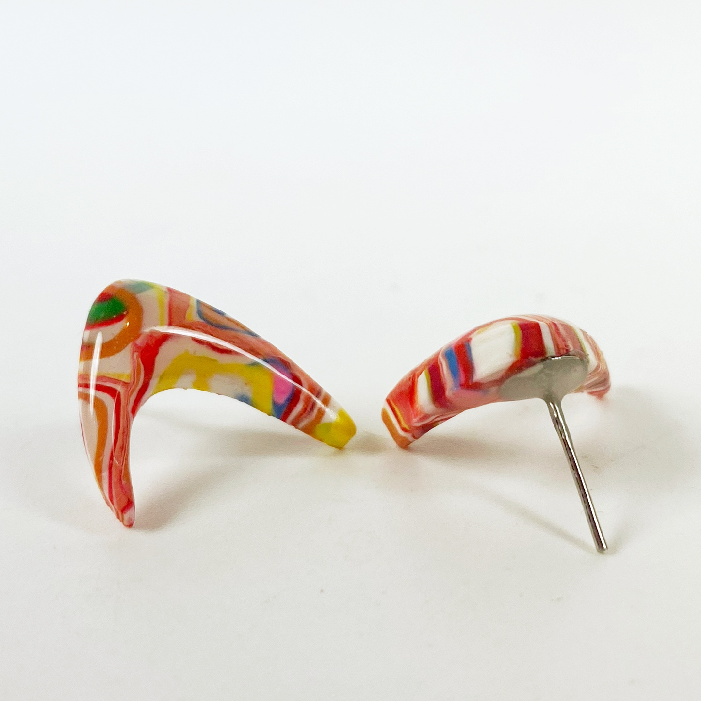 Pink Boomerang Stud Earrings showing the front and the back of the earrings