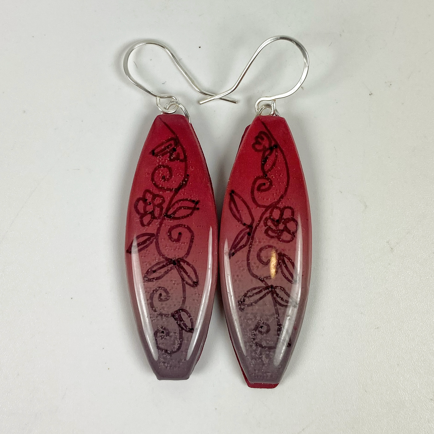 Polymer Clay Twilight Garden Handmade Dangle Earrings on a neutral grey background