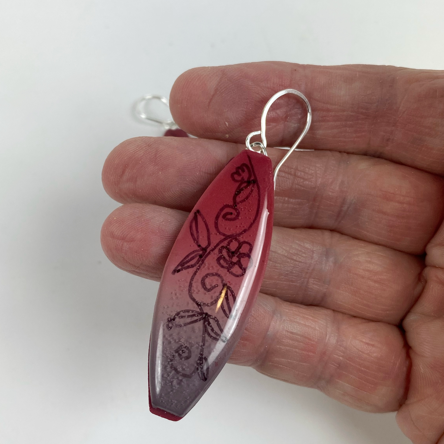 Polymer Clay Twilight Garden Handmade Dangle Earrings handheld for size reference