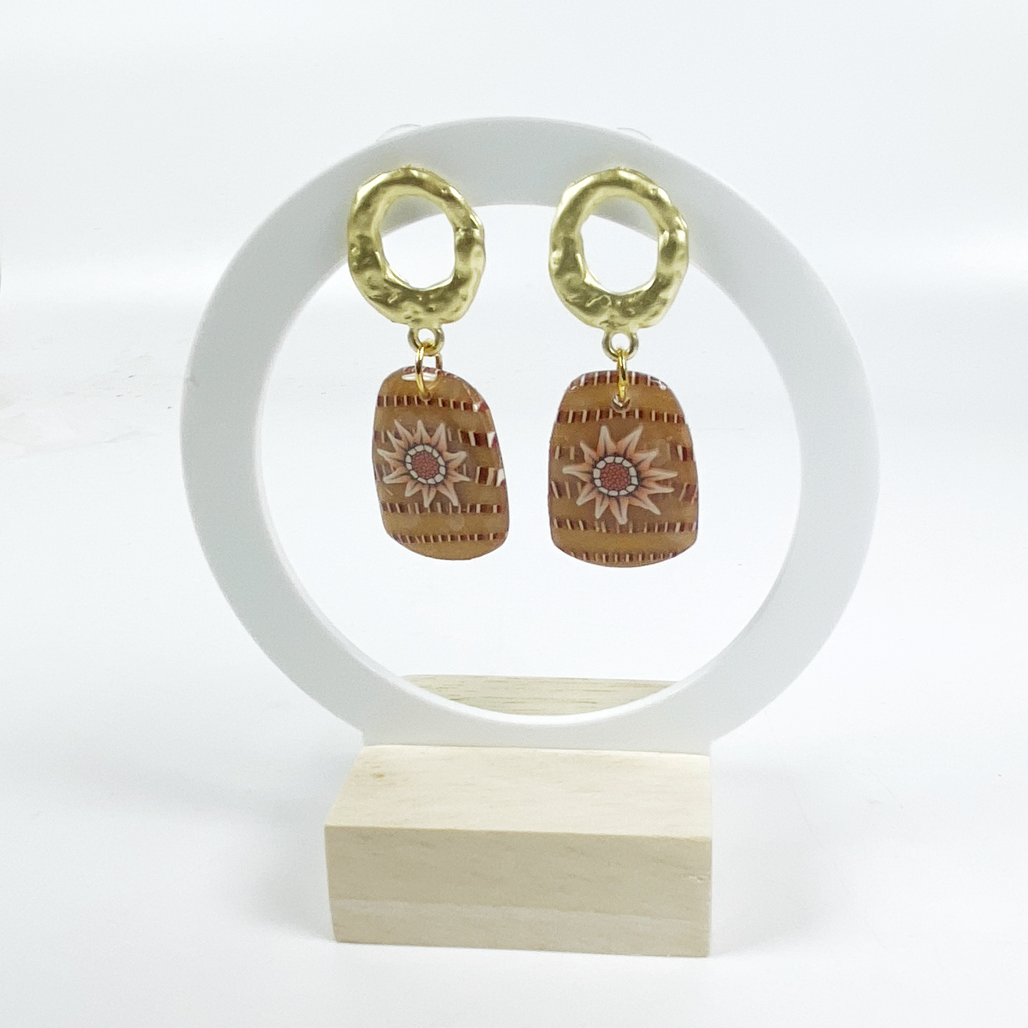 Saffron Daisy Polymer Clay Earrings  on acrylic display stand