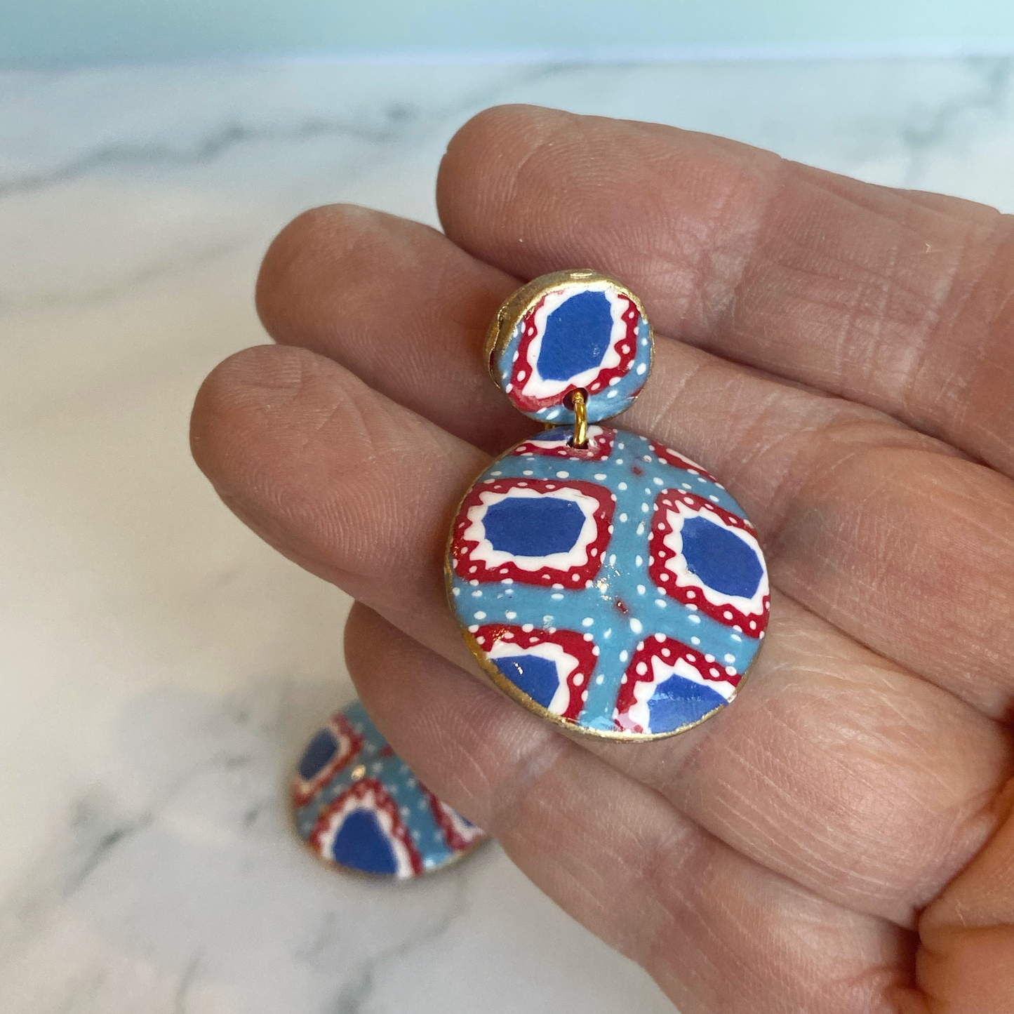 Handmade Polymer Clay Bandana Dangle Earrings handheld for size reference