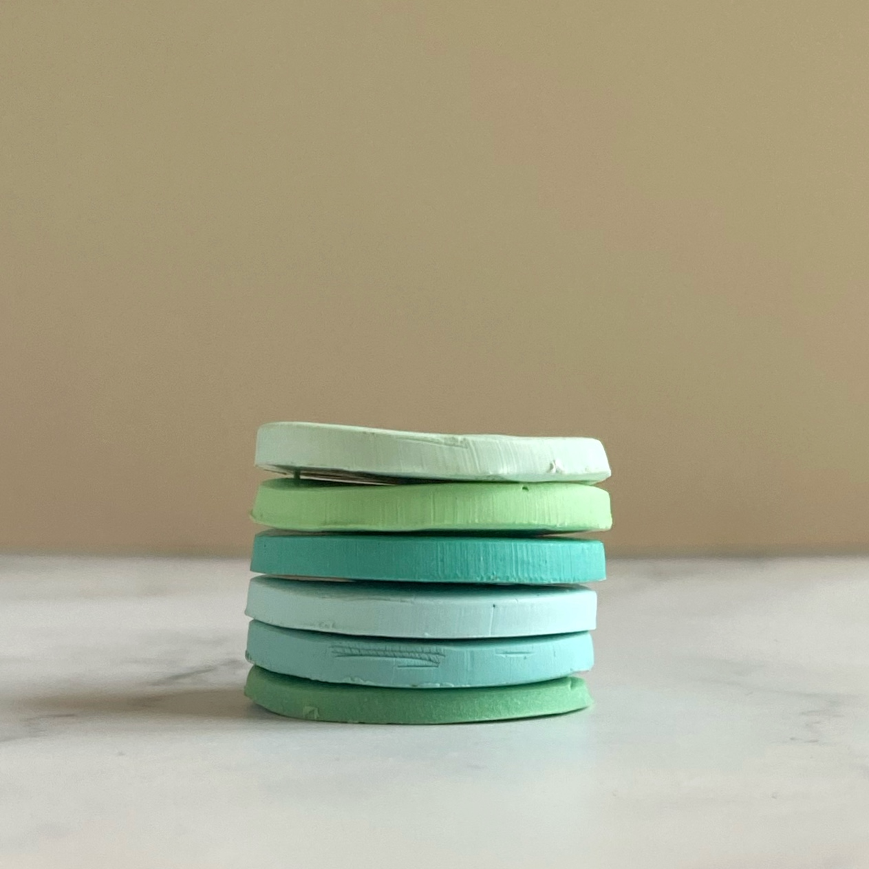 Tide Pool Palette, the sample clay discs shown in a stack