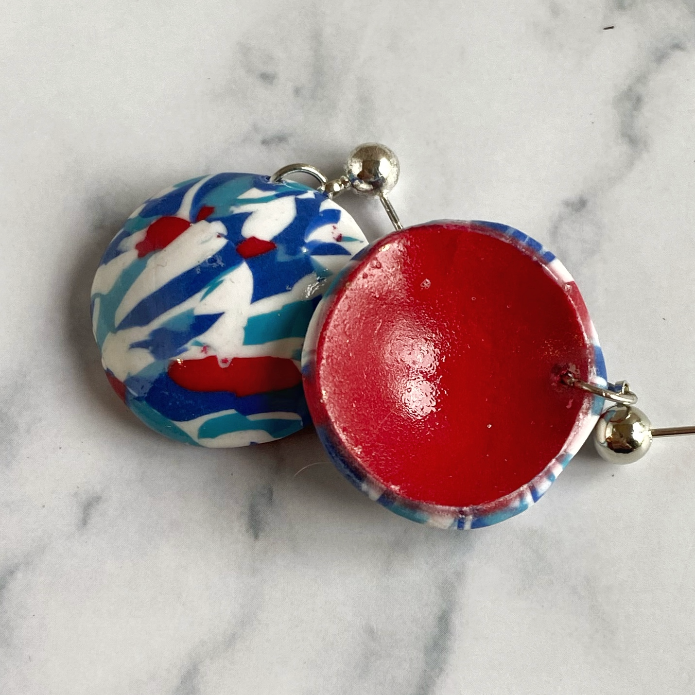 Handmade Polymer Clay Red White and Blue Earrings, sghowing solid red back