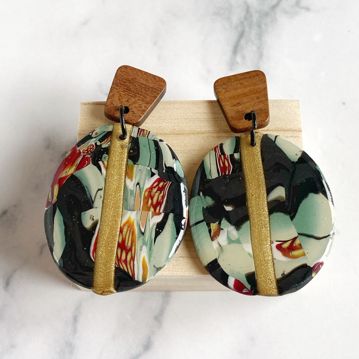 Black Gold and Green Marbled Handmade Polymer Clay Earrings front view