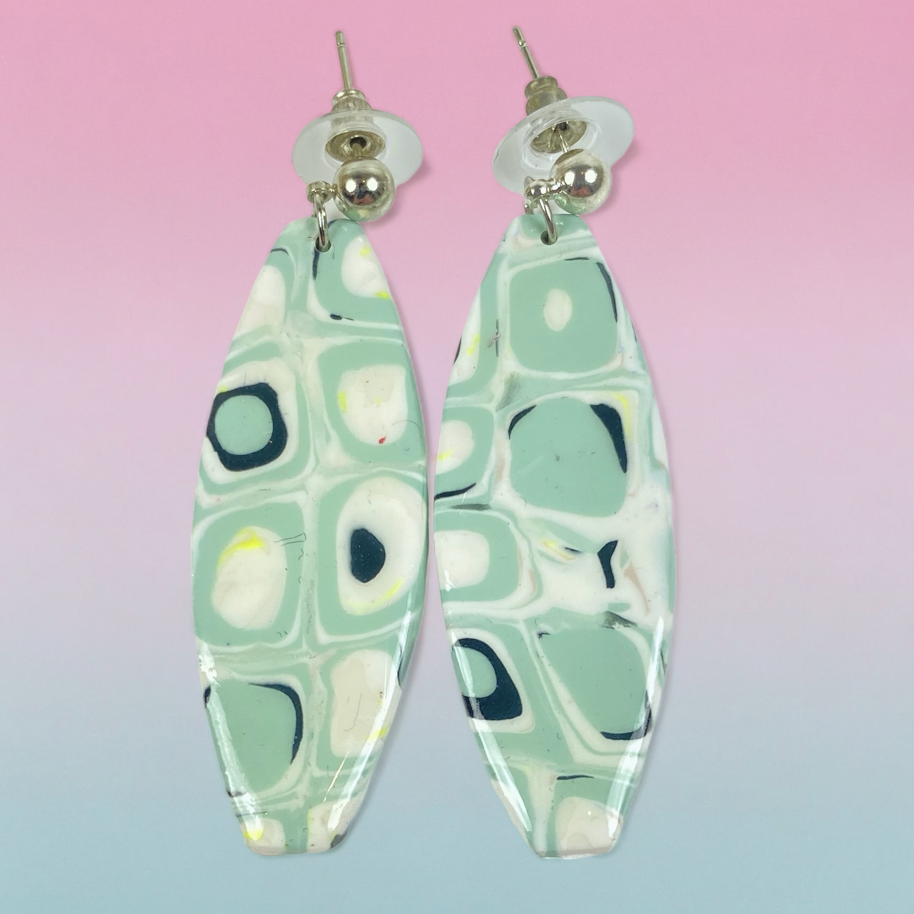 Dreamy Mint Noir Earrings on a pastel background