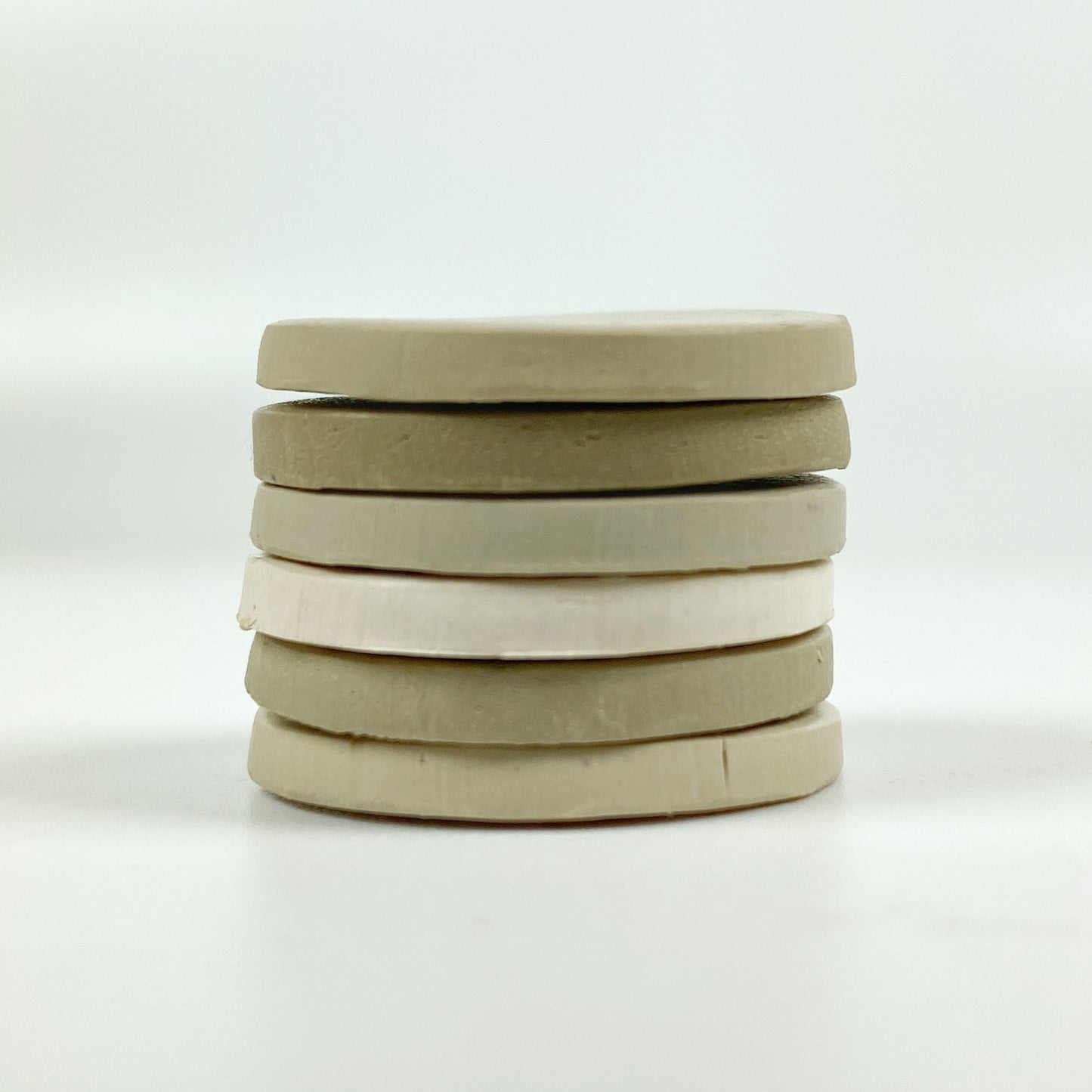 Stacked discs of each polymer clay color in this palette